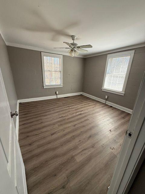 5715 Harding Drive Mableton, GA 30126 - Photo 9 of 13 wooden floor in an empty room with a window
