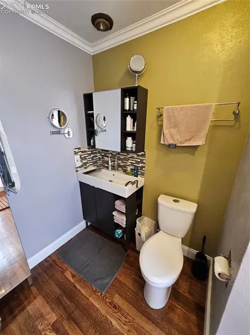 a bathroom with a sink and a toilet