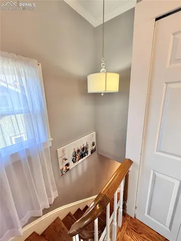 a room with furniture and wooden floor