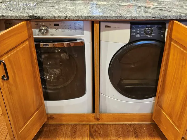 a utility room with dryer and washer