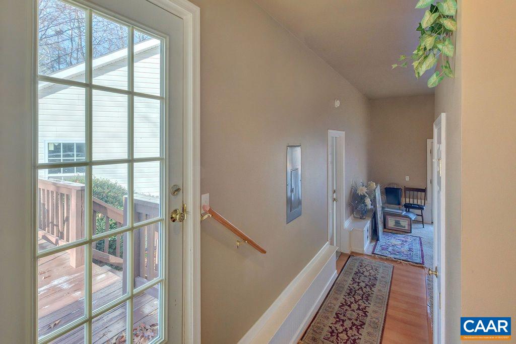 14 Powhatan Road Palmyra, VA 22963 - Photo 16 of 38 a view of hallway with wooden floor and a rug
