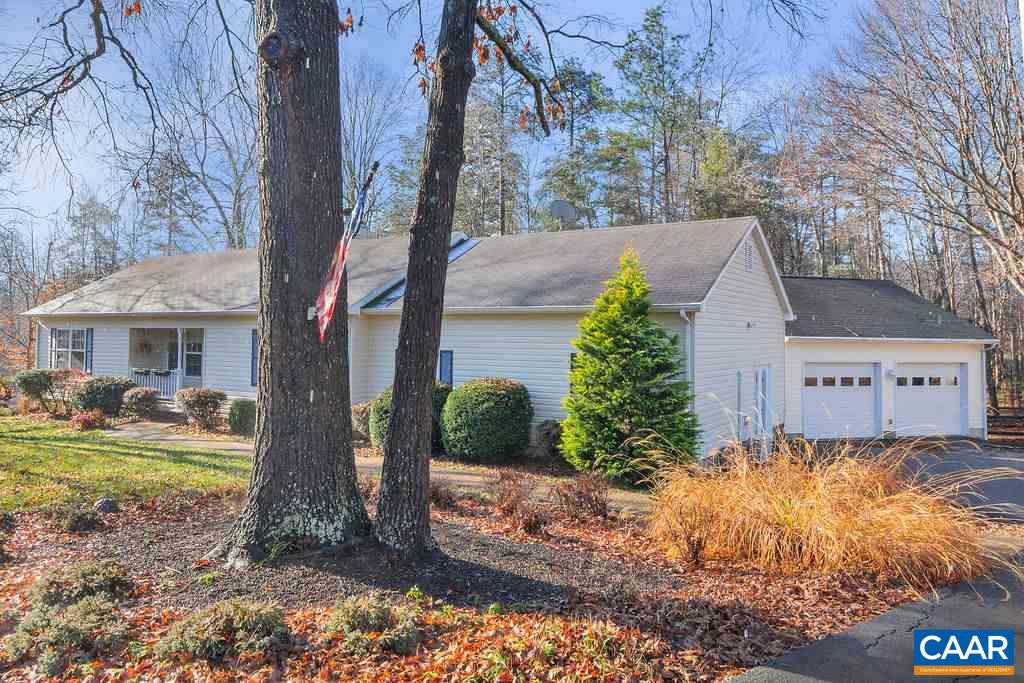 14 Powhatan Road Palmyra, VA 22963 - Photo 2 of 38 a front view of a house with garden