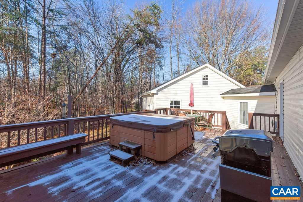 14 Powhatan Road Palmyra, VA 22963 - Photo 33 of 38 a view of a house with wooden deck and furniture