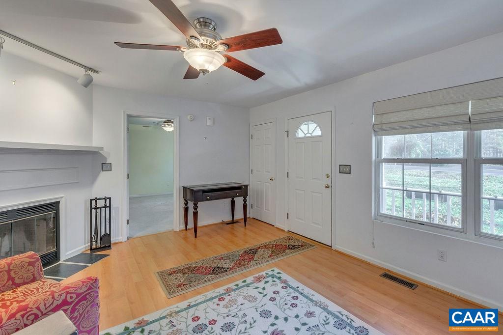 14 Powhatan Road Palmyra, VA 22963 - Photo 7 of 38 a bedroom with a bed and a fireplace