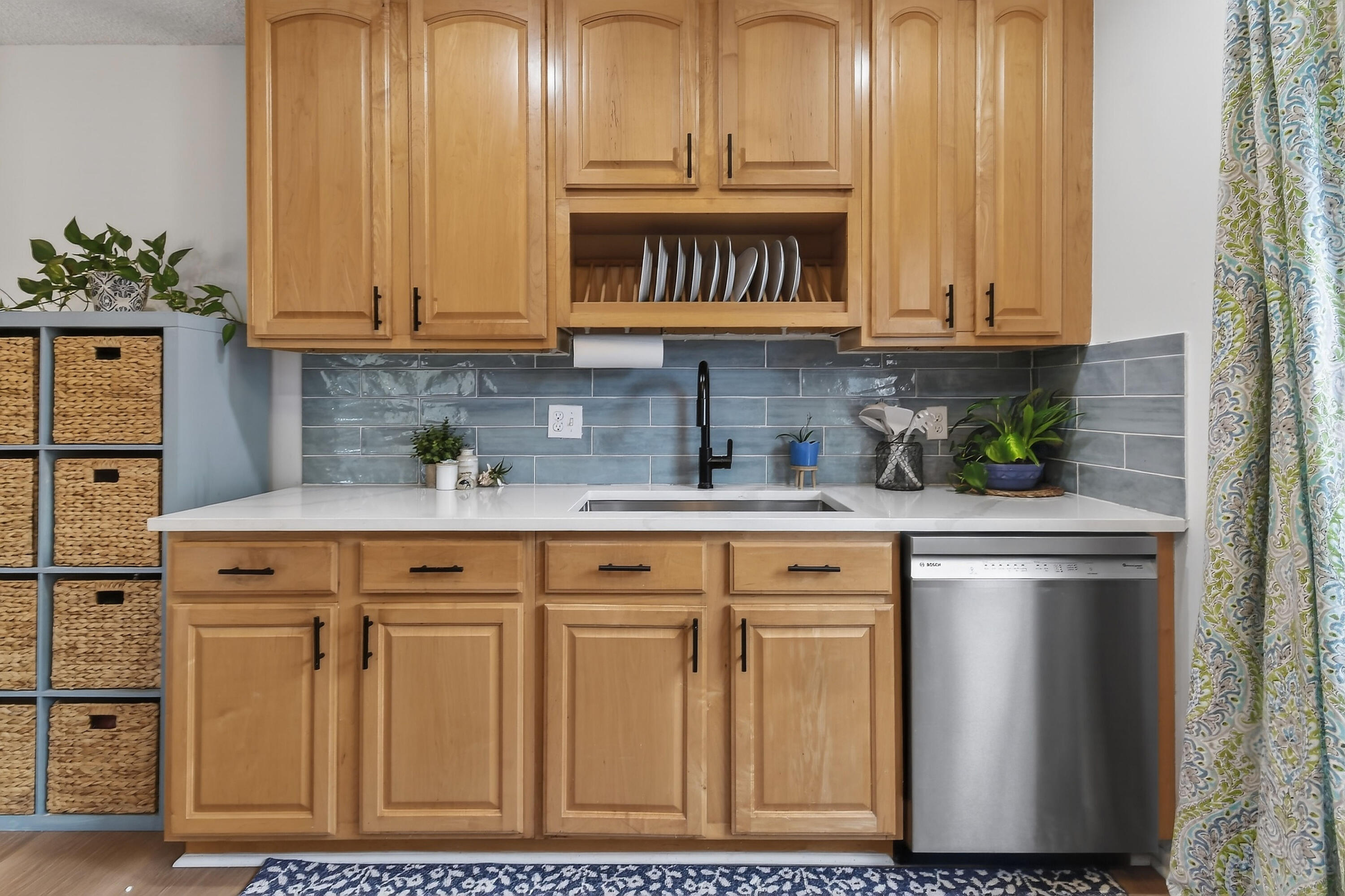 717 Highway 1, Unit 912 Jupiter, FL 33477 - Photo 13 of 45 a kitchen with stainless steel appliances granite countertop a stove a sink and a white cabinets