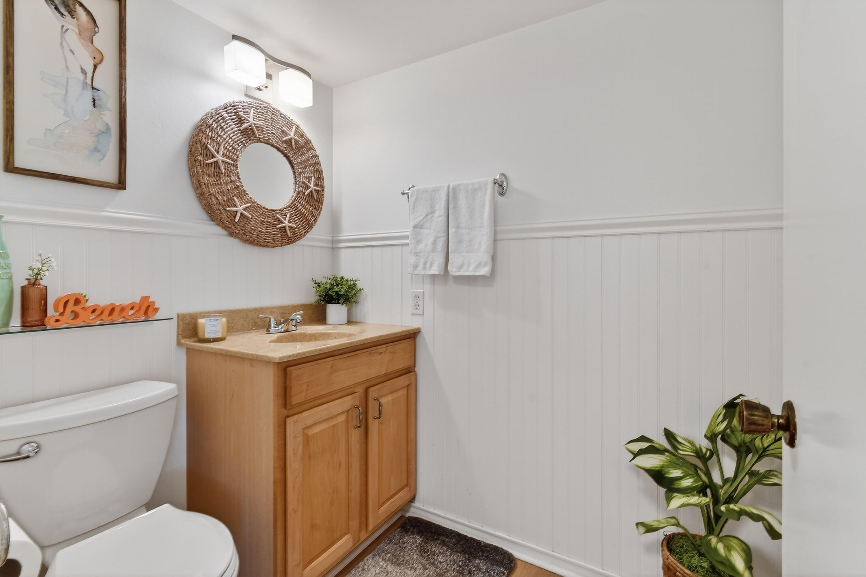 717 Highway 1, Unit 912 Jupiter, FL 33477 - Photo 17 of 45 a bathroom with a toilet and a sink