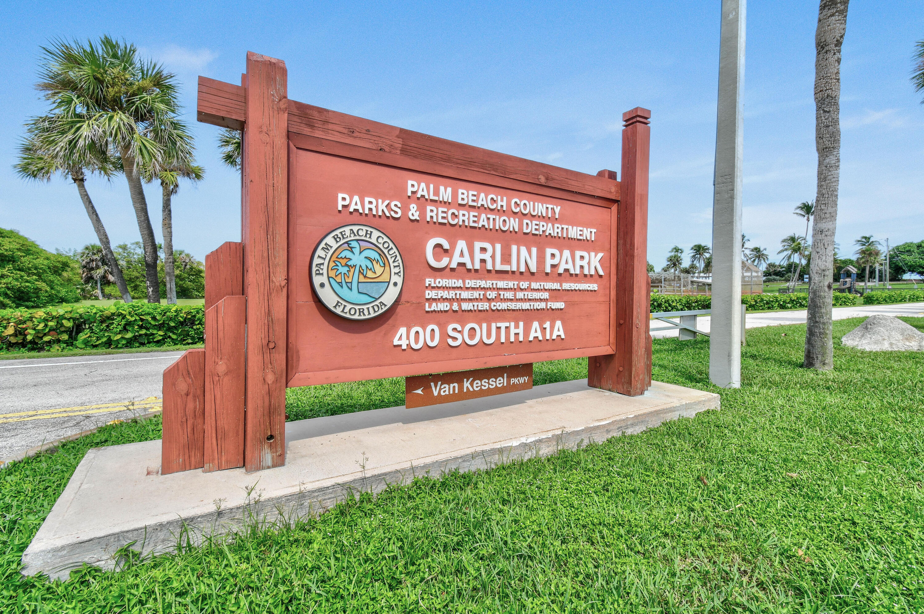 717 Highway 1, Unit 912 Jupiter, FL 33477 - Photo 35 of 45 a sign on the side of a road
