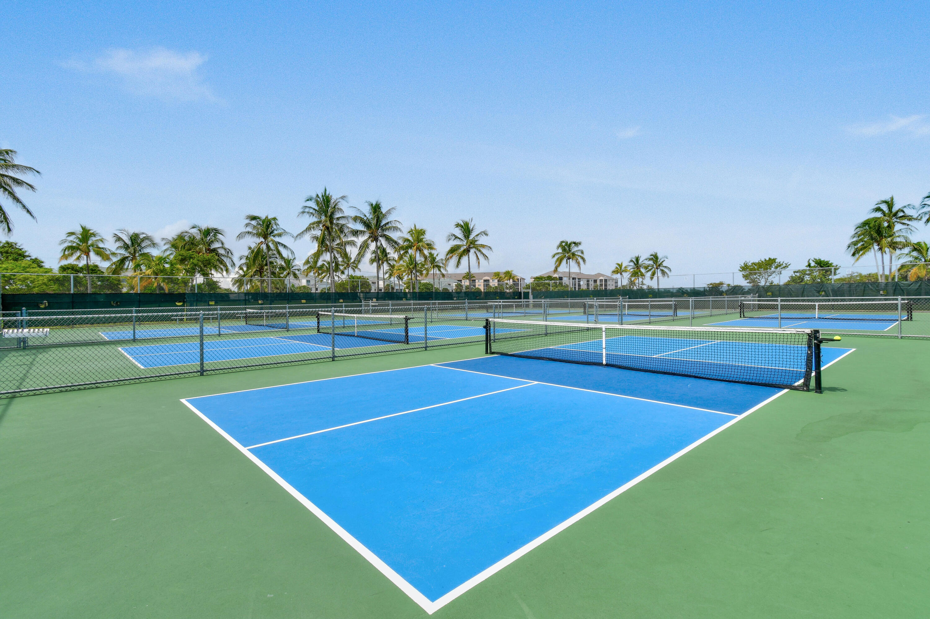 717 Highway 1, Unit 912 Jupiter, FL 33477 - Photo 43 of 45 a view of an outdoor space and tennis court