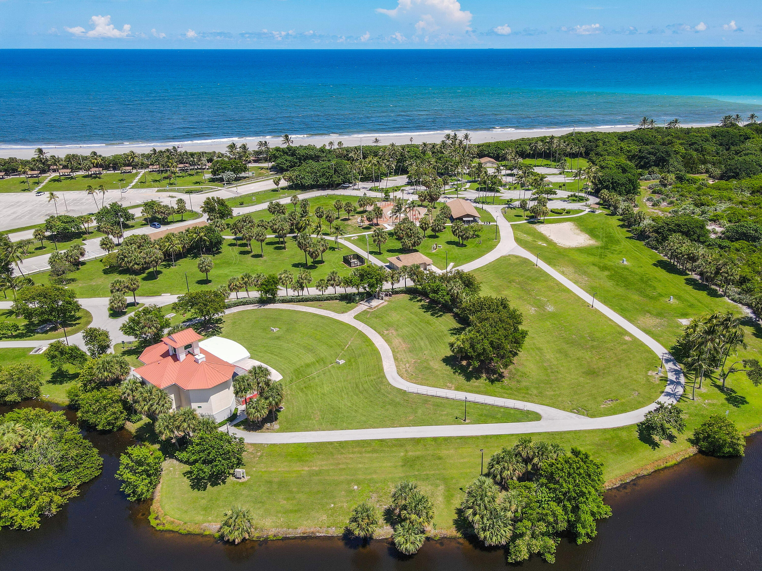 717 Highway 1, Unit 912 Jupiter, FL 33477 - Photo 44 of 45 a view of a swimming pool with a yard