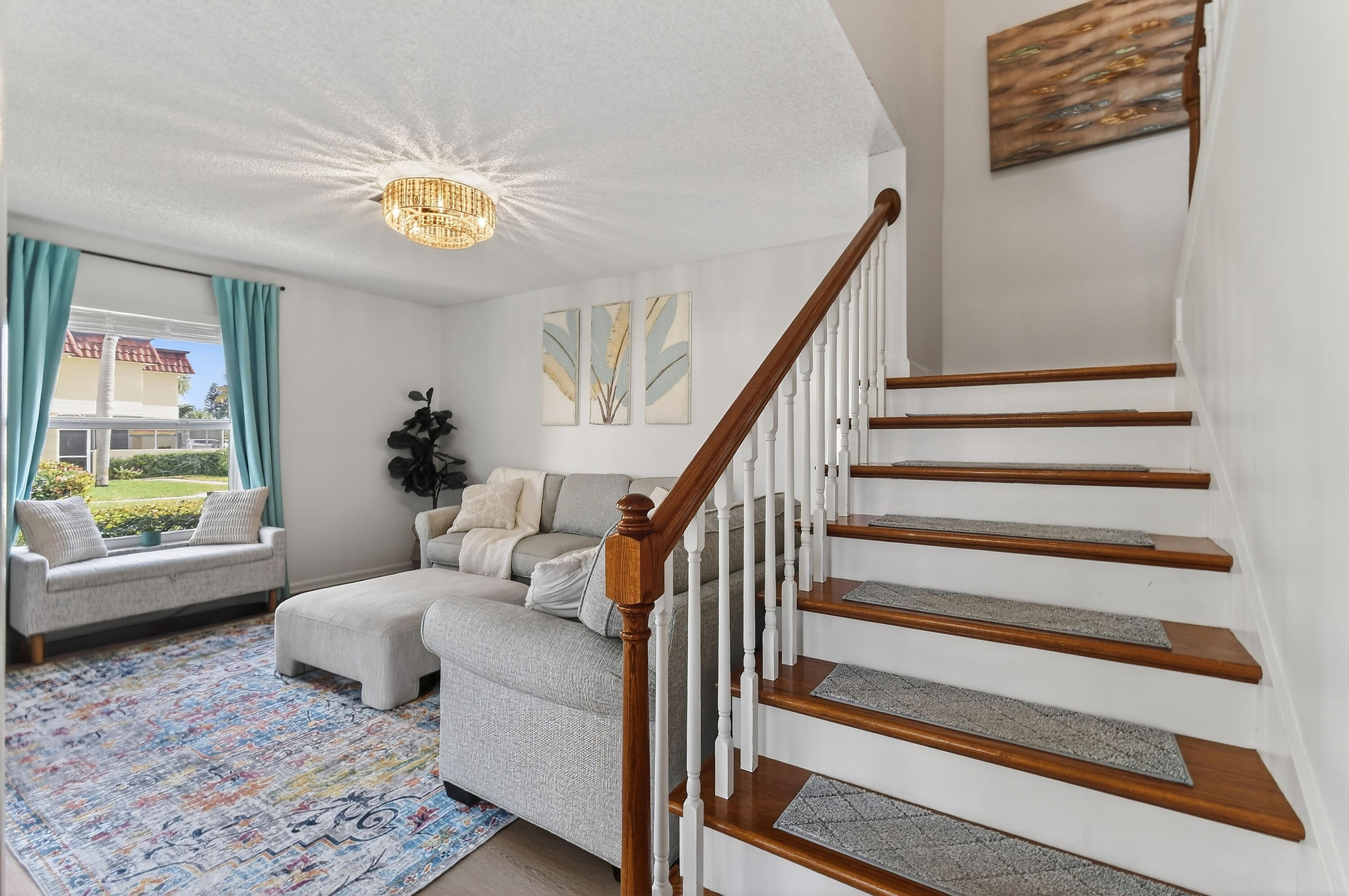 717 Highway 1, Unit 912 Jupiter, FL 33477 - Photo 5 of 45 a living room with furniture and a table