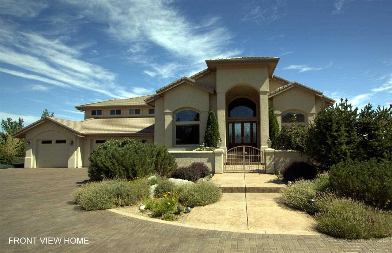 330 Juniper Hill Road Reno, NV 89519 - Photo 1 of 1 a front view of a house with a yard