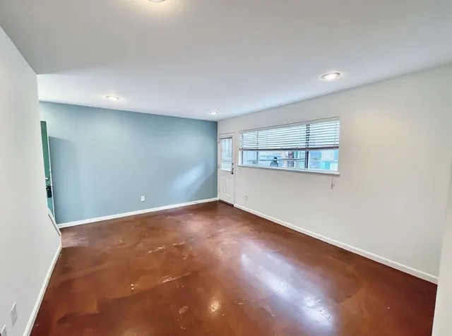 an empty room with a window