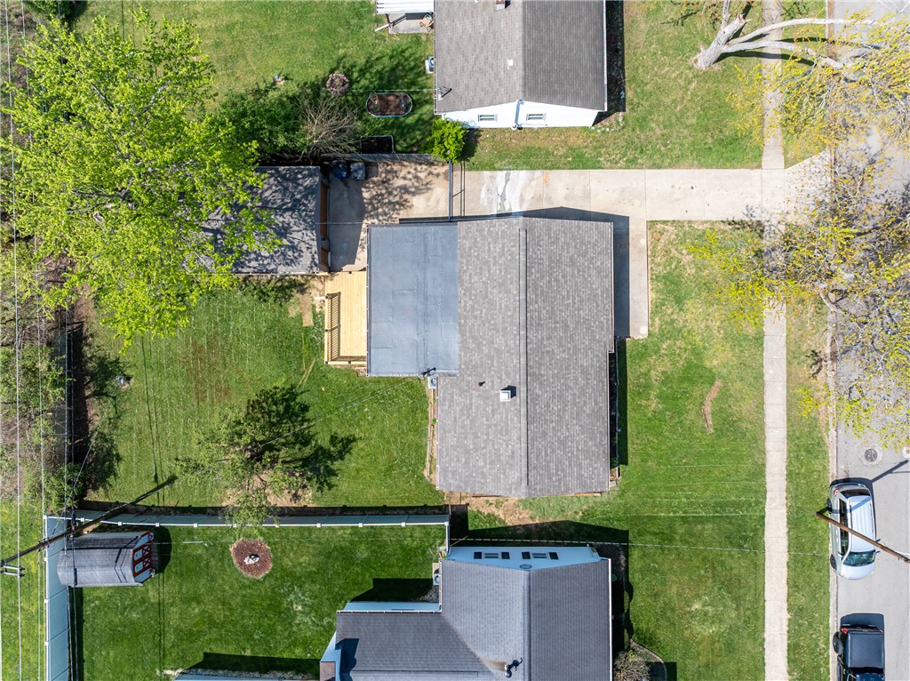 5240 Haverfield Road Dayton, OH 45432 - Photo 54 of 58 An aerial perspective reveals a property with ample yard space and mature trees.