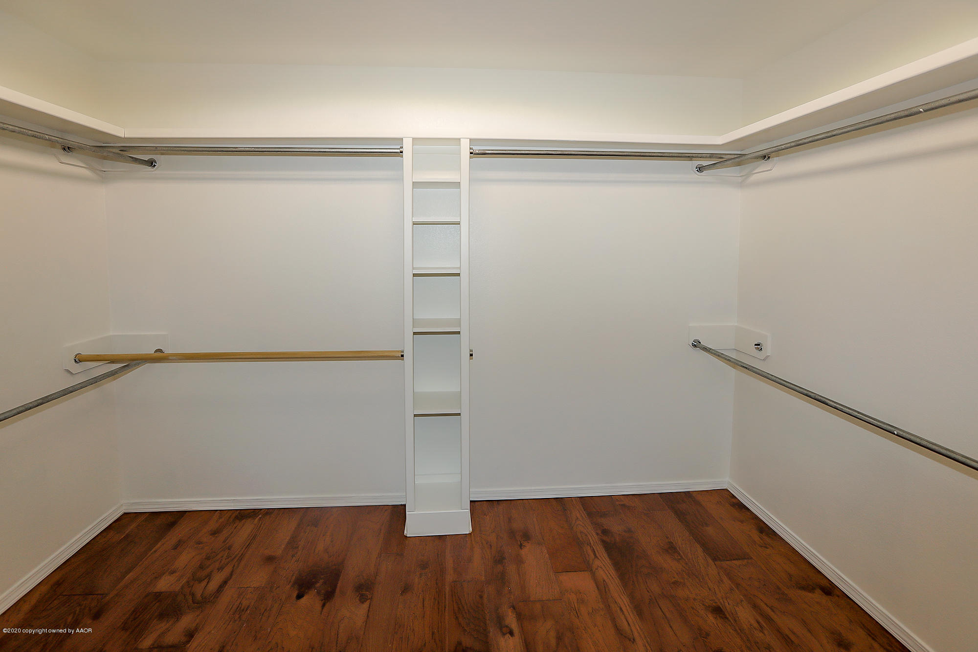 7003 Nick Street Amarillo, TX 79119 - Photo 15 of 34 a view of an empty walk in closet