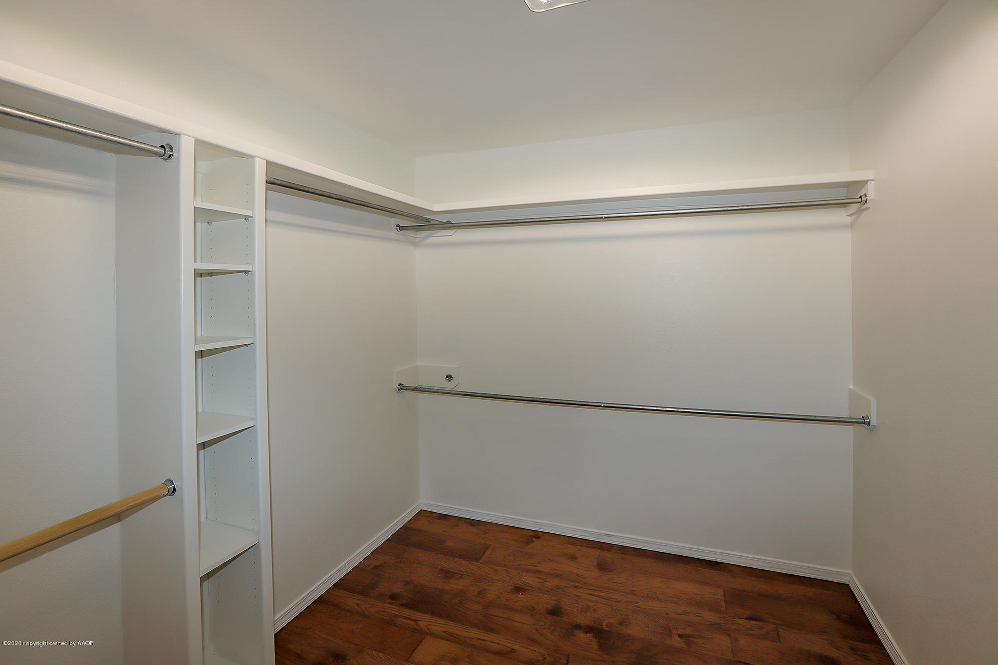 7003 Nick Street Amarillo, TX 79119 - Photo 16 of 34 a view of an empty walk in closet