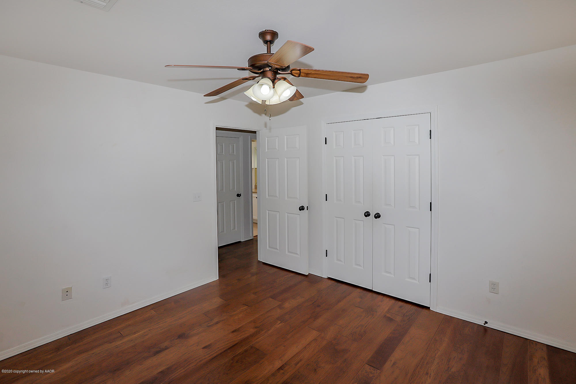 7003 Nick Street Amarillo, TX 79119 - Photo 18 of 34 a view of a room with wooden floor