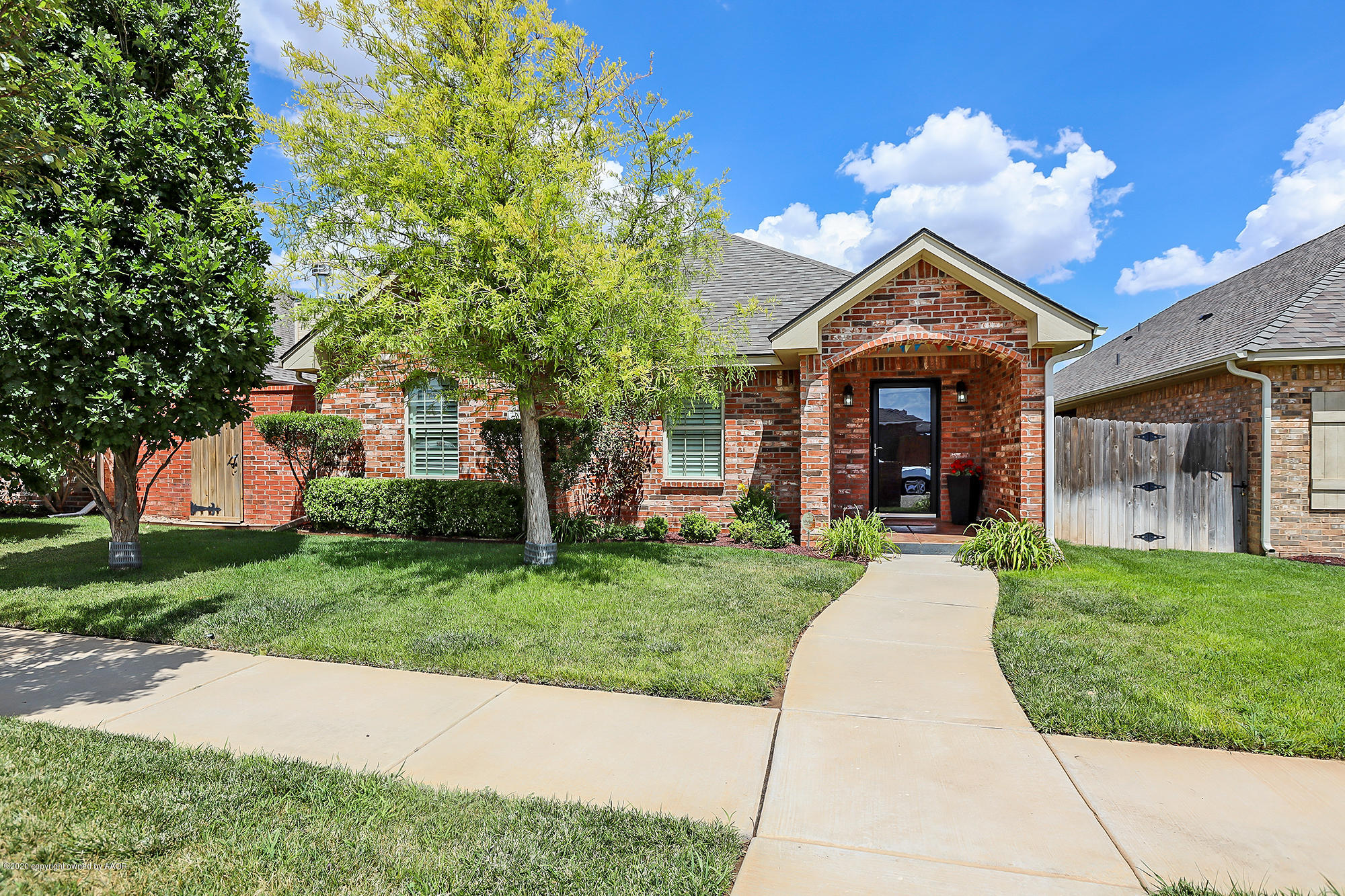 7003 Nick Street Amarillo, TX 79119 - Photo 2 of 34 front view of a house with a yard