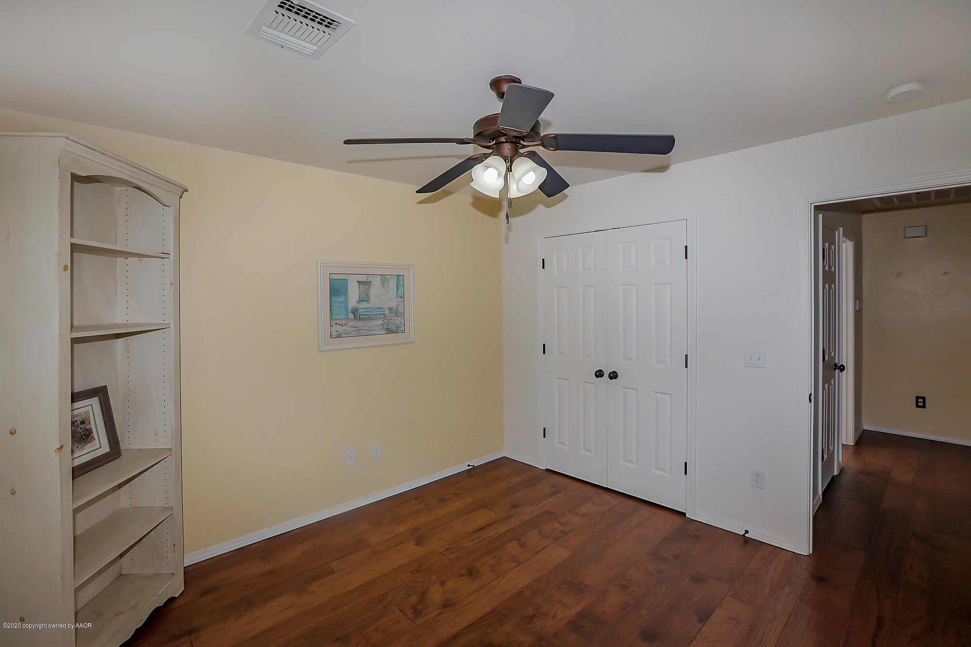 7003 Nick Street Amarillo, TX 79119 - Photo 21 of 34 a view of empty room with wooden floor