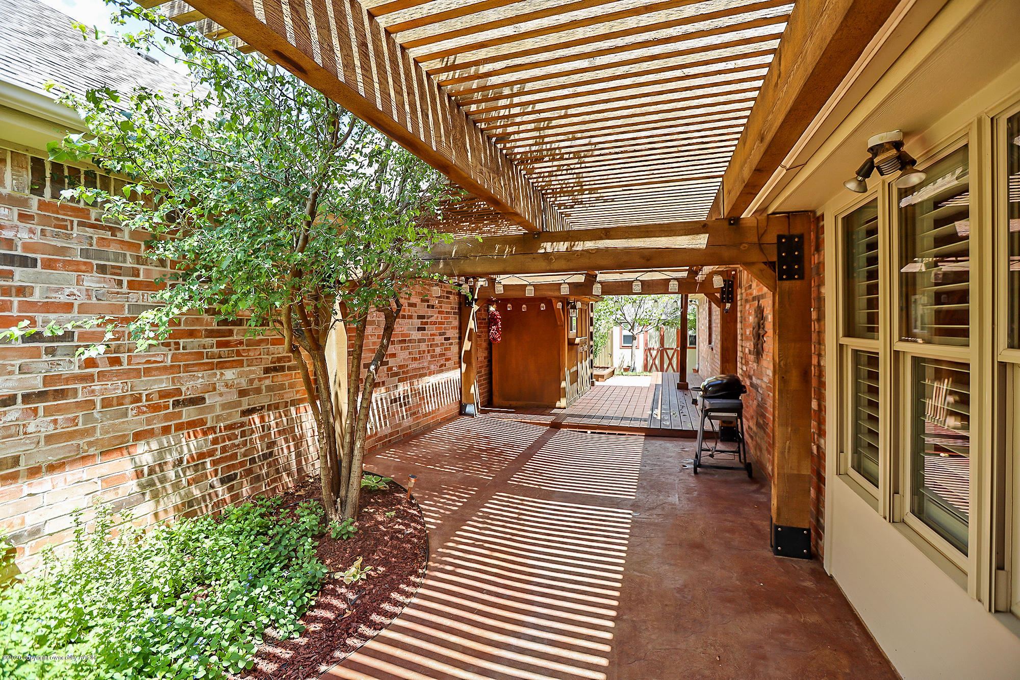 7003 Nick Street Amarillo, TX 79119 - Photo 28 of 34 a view of outdoor space with wooden deck