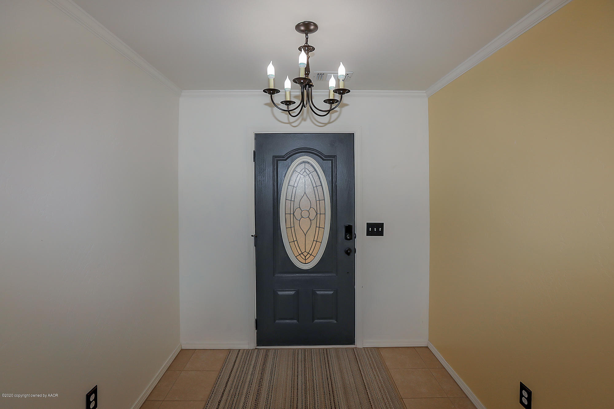 7003 Nick Street Amarillo, TX 79119 - Photo 3 of 34 a view of a hallway with wooden floor