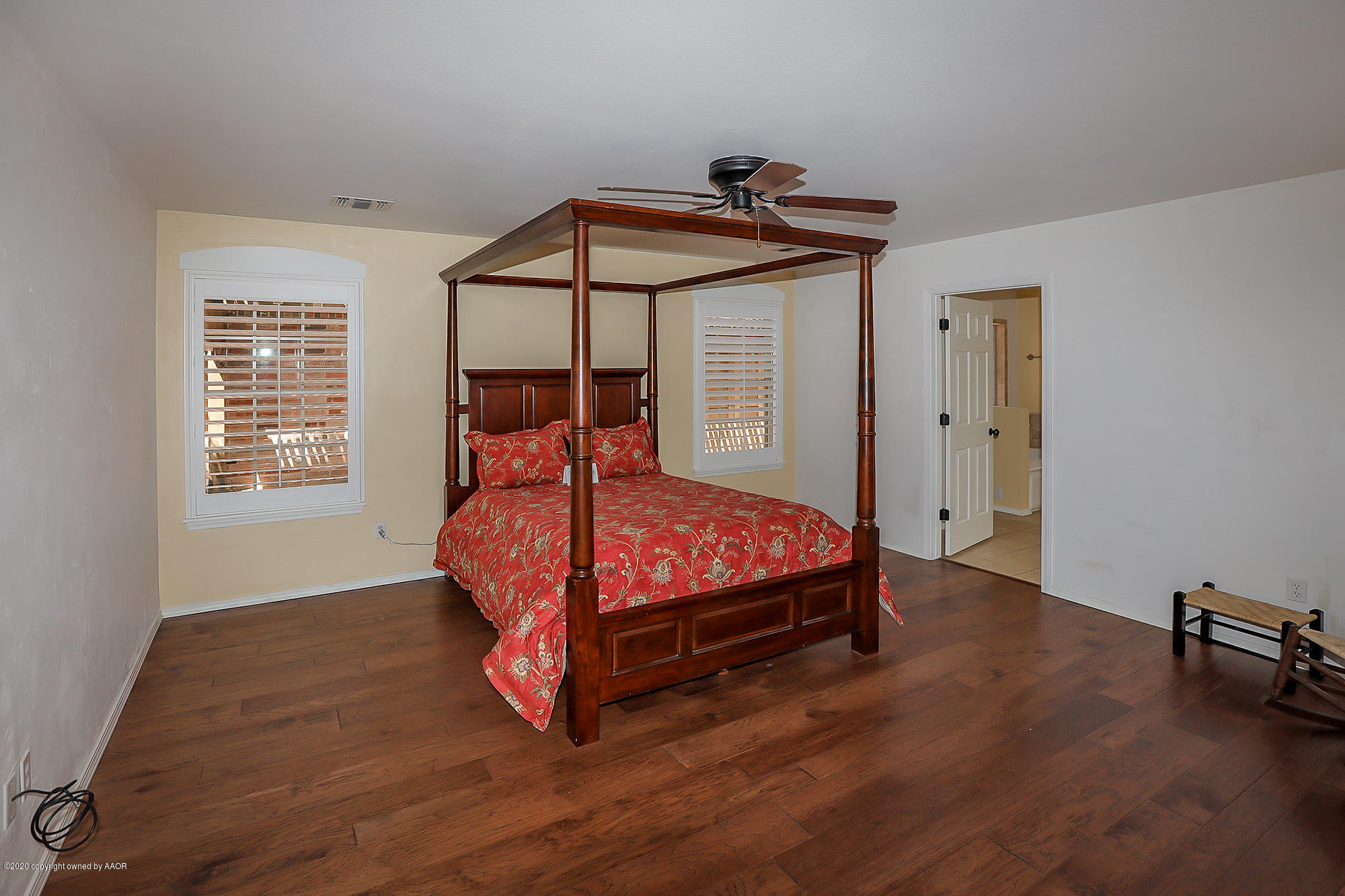 7003 Nick Street Amarillo, TX 79119 - Photo 10 of 34 a bedroom with a bed and a window