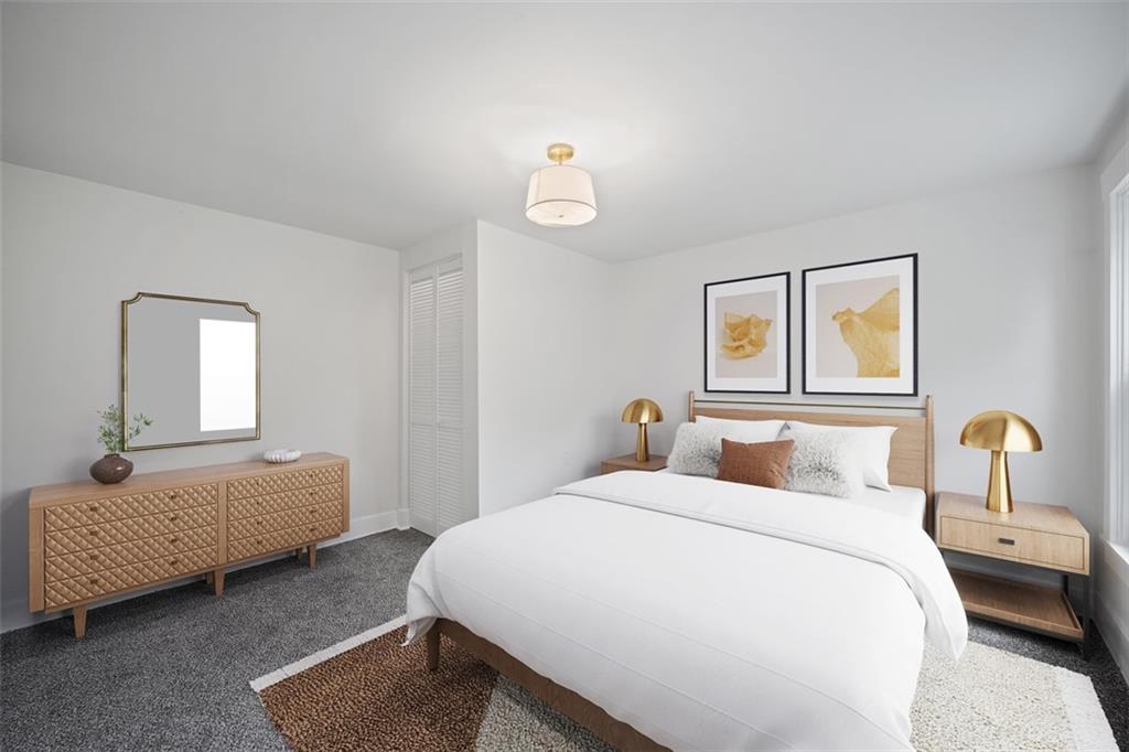 230 Linnview Avenue Pittsburgh, PA 15210 - Photo 4 of 32 a bedroom with bed and window