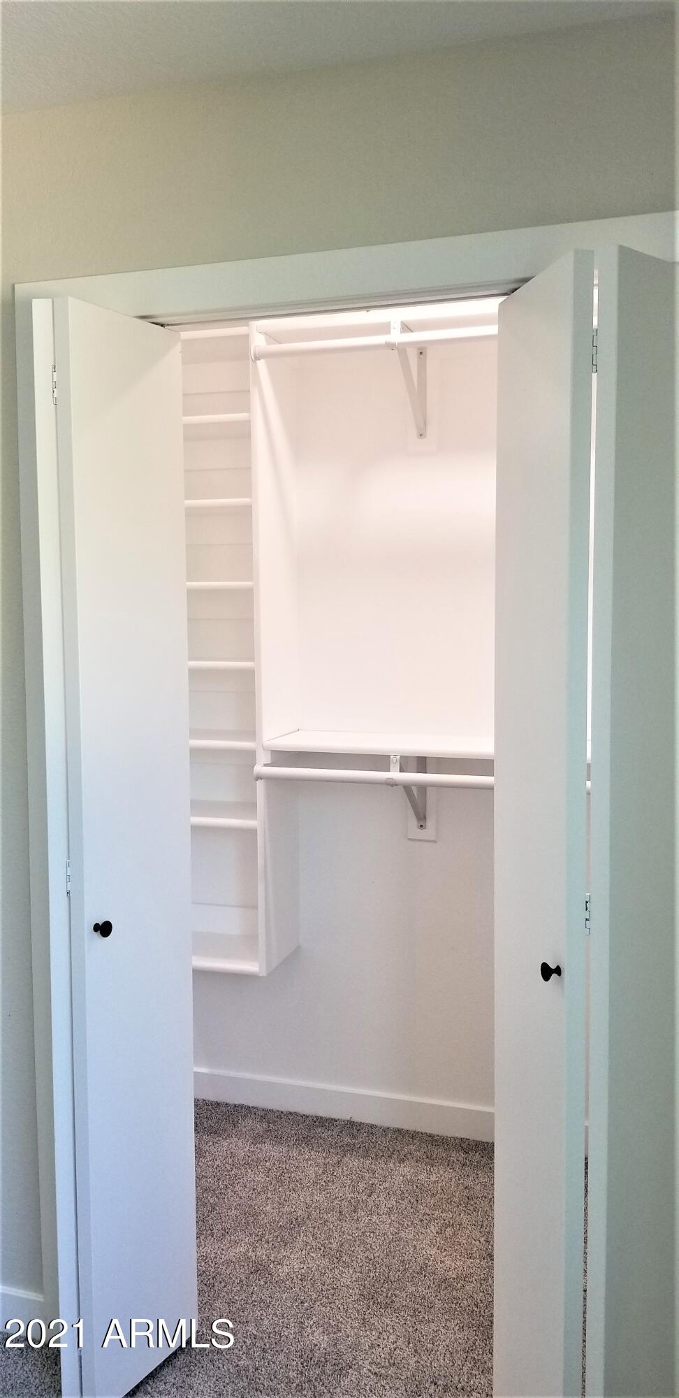 2738 East Decatur Street Mesa, AZ 85213 - Photo 42 of 52 Half of Master Bedroom Walk In Closet