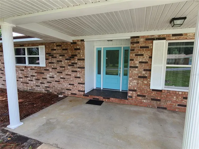 a front view of a house with a garage