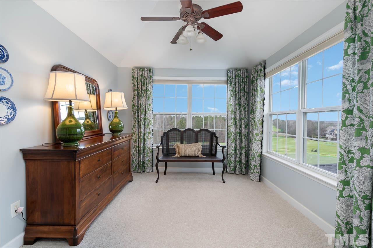 612 Seastone Street Raleigh, NC 27603 - Photo 29 of 41 a bedroom with furniture and a window