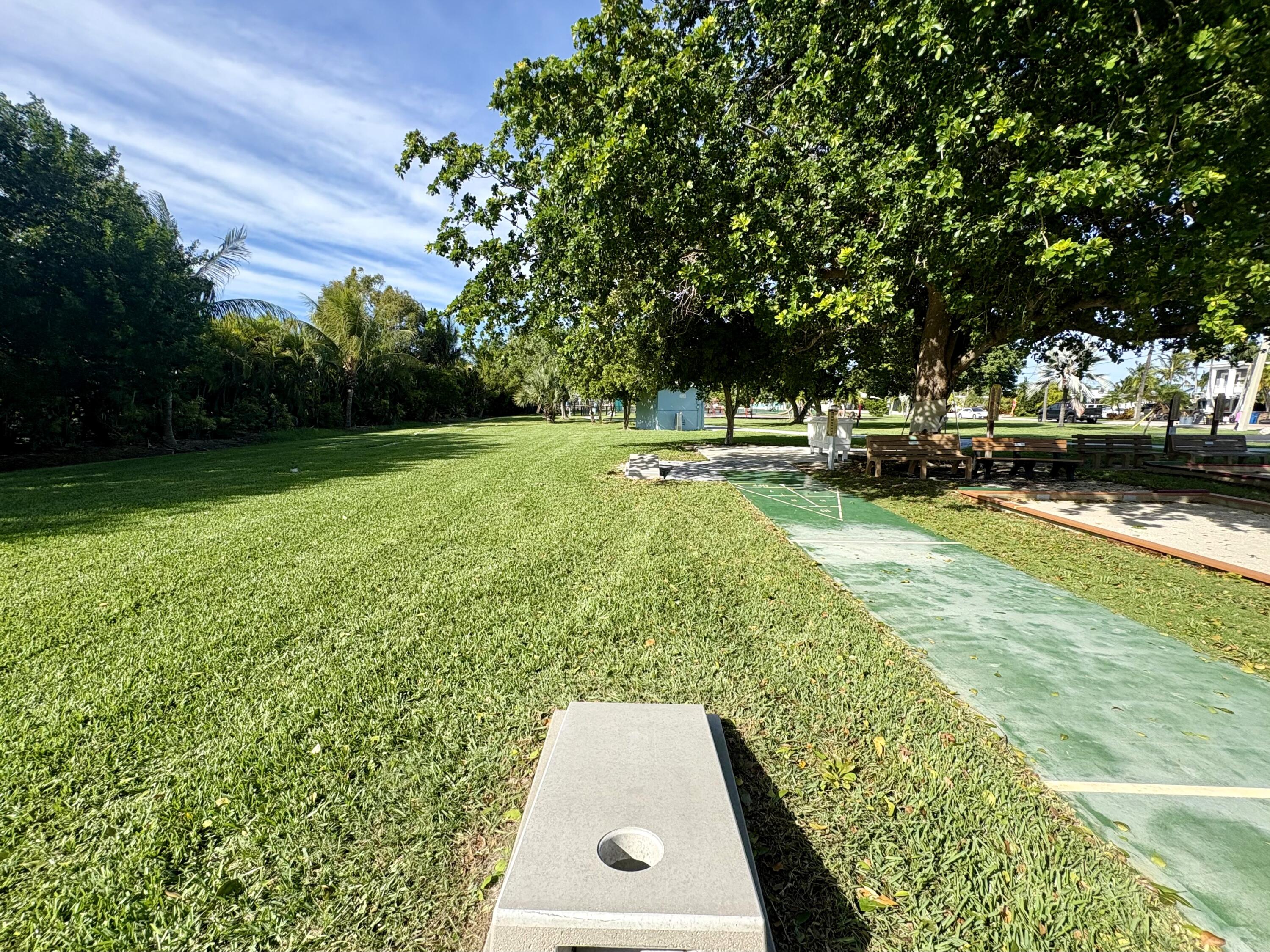 271 9th Street Key Colony Beach, FL 33051 - Photo 40 of 48 a view of yard with swimming pool