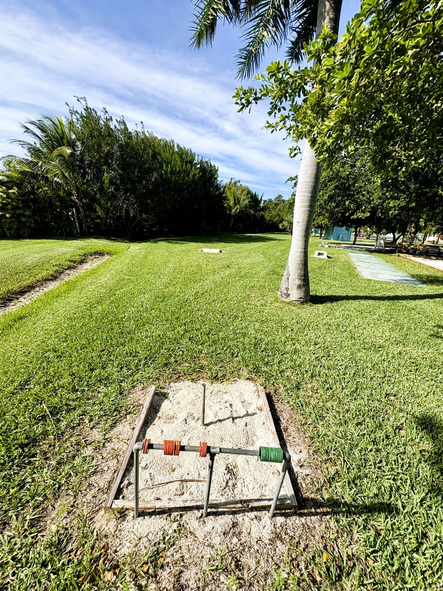271 9th Street Key Colony Beach, FL 33051 - Photo 42 of 48 a view of a yard with a tree