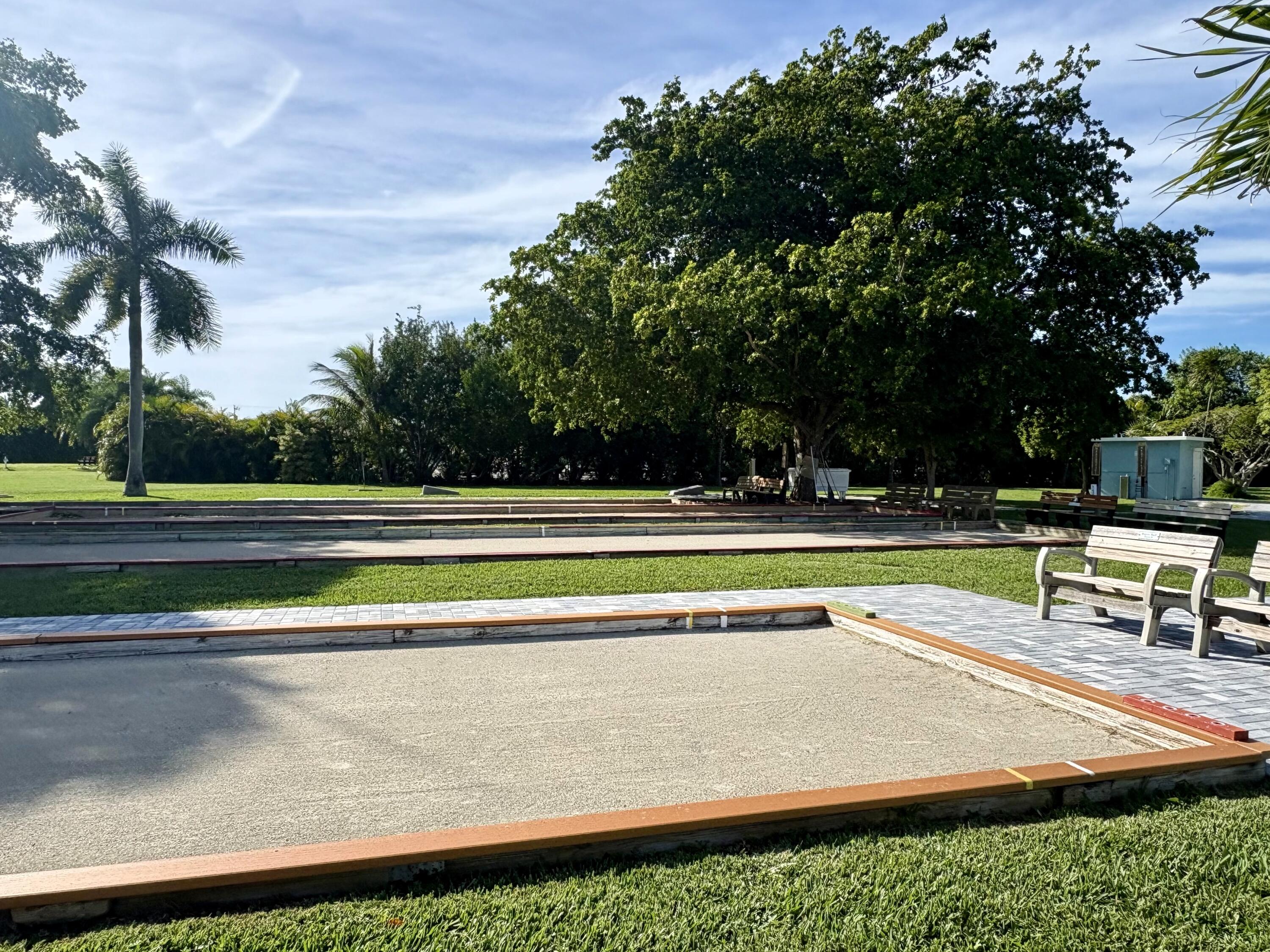 271 9th Street Key Colony Beach, FL 33051 - Photo 44 of 48 a view of a swimming pool with a yard