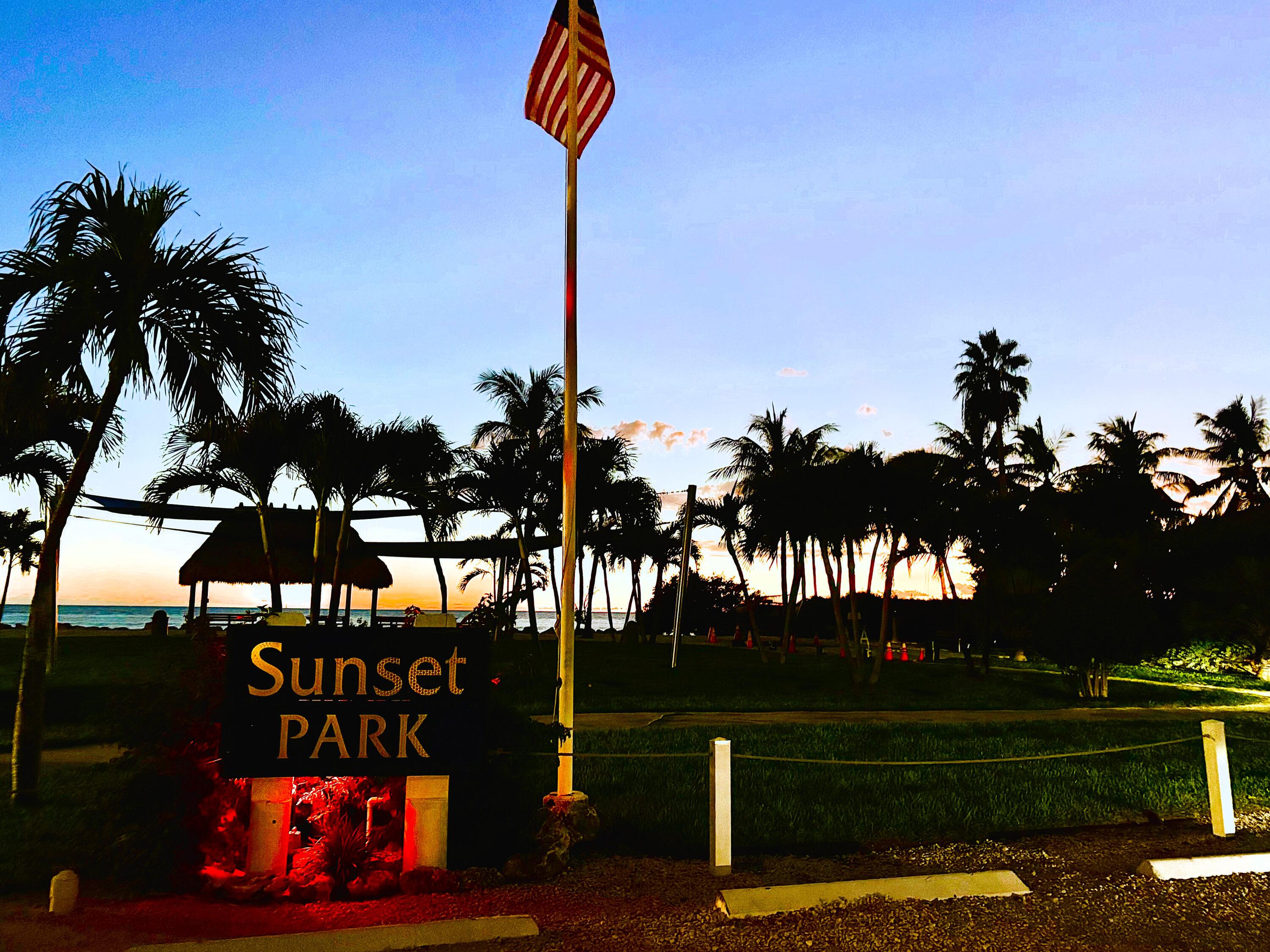 271 9th Street Key Colony Beach, FL 33051 - Photo 47 of 48 a front view of a house with sign board