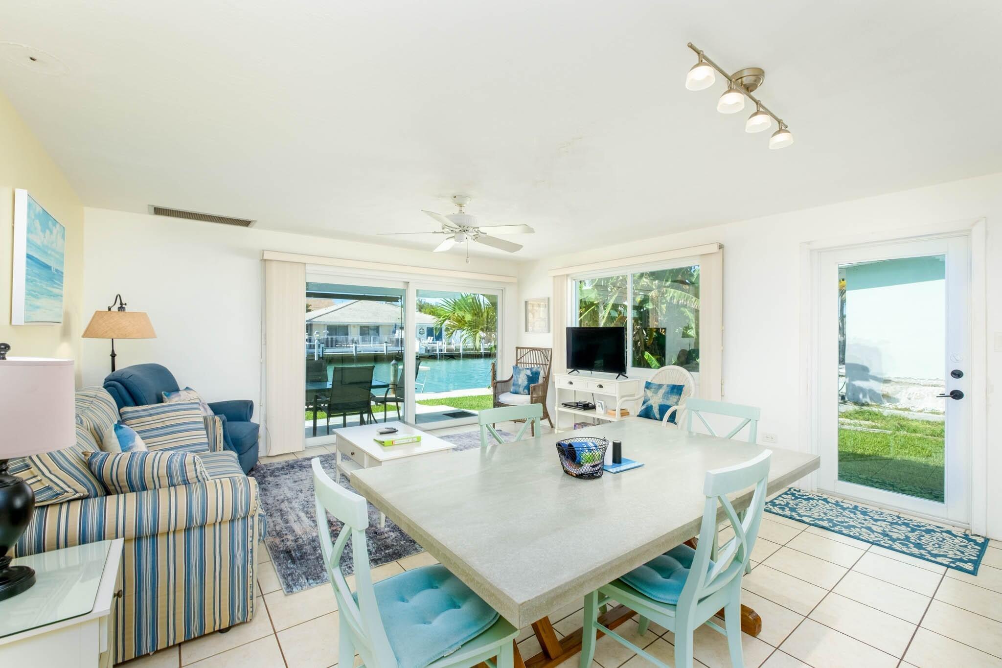 271 9th Street Key Colony Beach, FL 33051 - Photo 8 of 48 a view of a dining room with furniture window and outside view