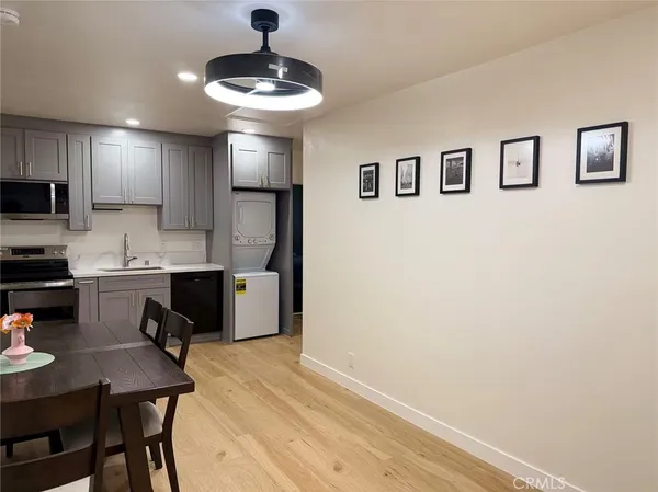 a bedroom with a bed and a tv