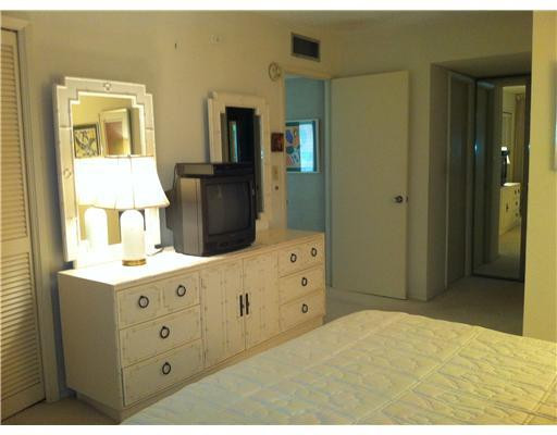 3080 North Course Drive, Unit 605 Pompano Beach, FL 33069 - Photo 9 of 13 Master Bedroom