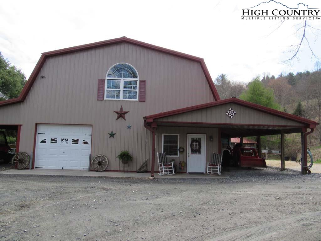 1487 Bryan Davis Road Creston, NC 28615 - Photo 43 of 50 a front view of a house with a yard