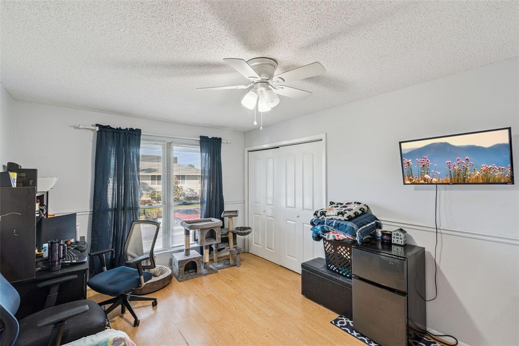 1935 South Conway Road, Unit 6 Orlando, FL 32812 - Photo 14 of 25 a living room with furniture and a large window