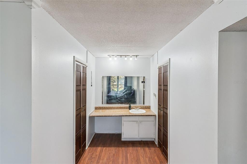 1935 South Conway Road, Unit 6 Orlando, FL 32812 - Photo 18 of 25 a view of bathroom with a sink and mirror