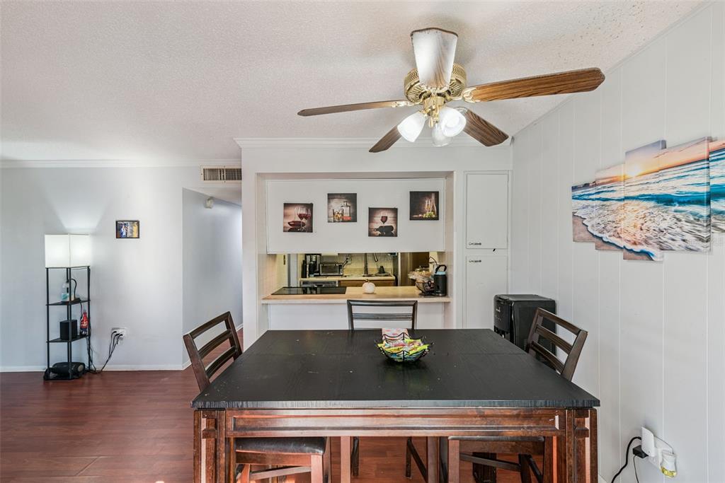 1935 South Conway Road, Unit 6 Orlando, FL 32812 - Photo 4 of 25 a living room with furniture and wooden floor