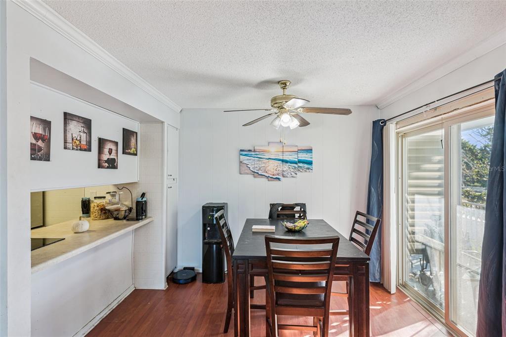 1935 South Conway Road, Unit 6 Orlando, FL 32812 - Photo 5 of 25 a view of a dining room with furniture and chandelier
