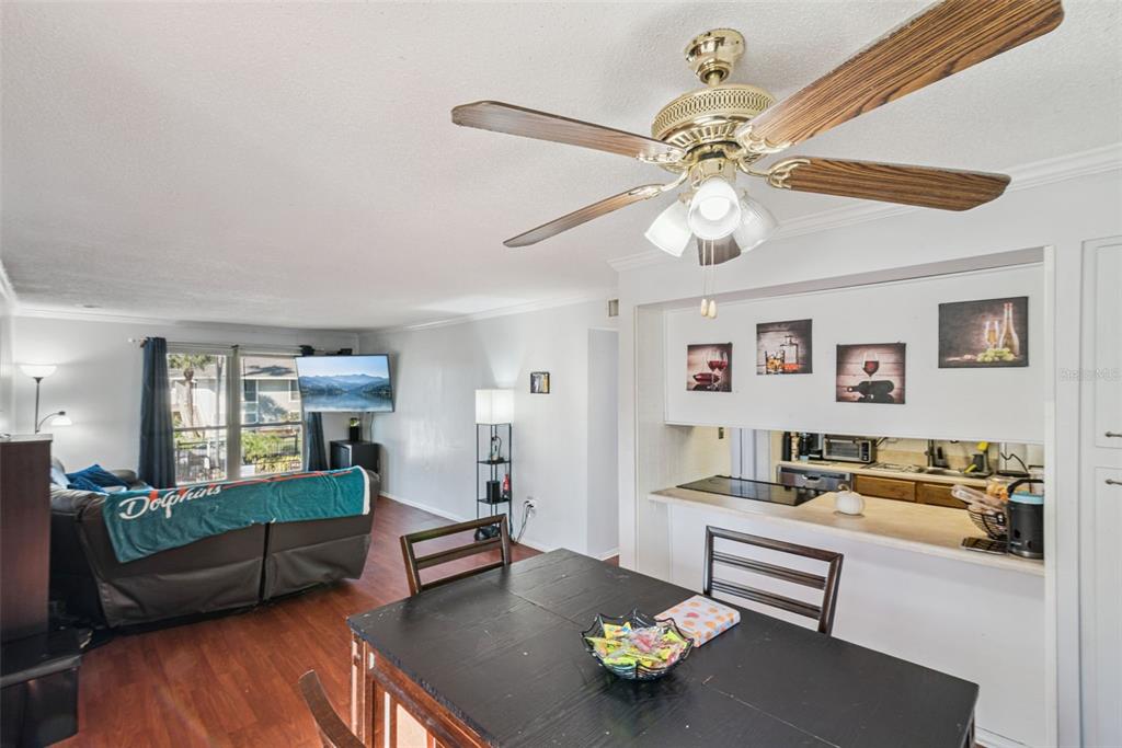 1935 South Conway Road, Unit 6 Orlando, FL 32812 - Photo 7 of 25 a living room with furniture and a table