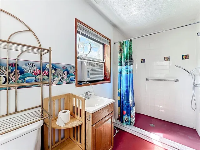 a room with furniture and a large window