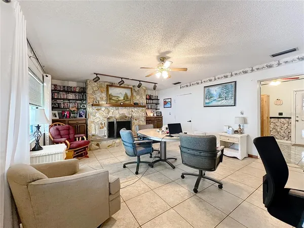 a living room with furniture and a table