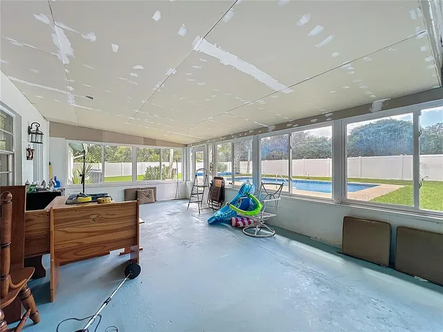 a front view of house with a garden and patio