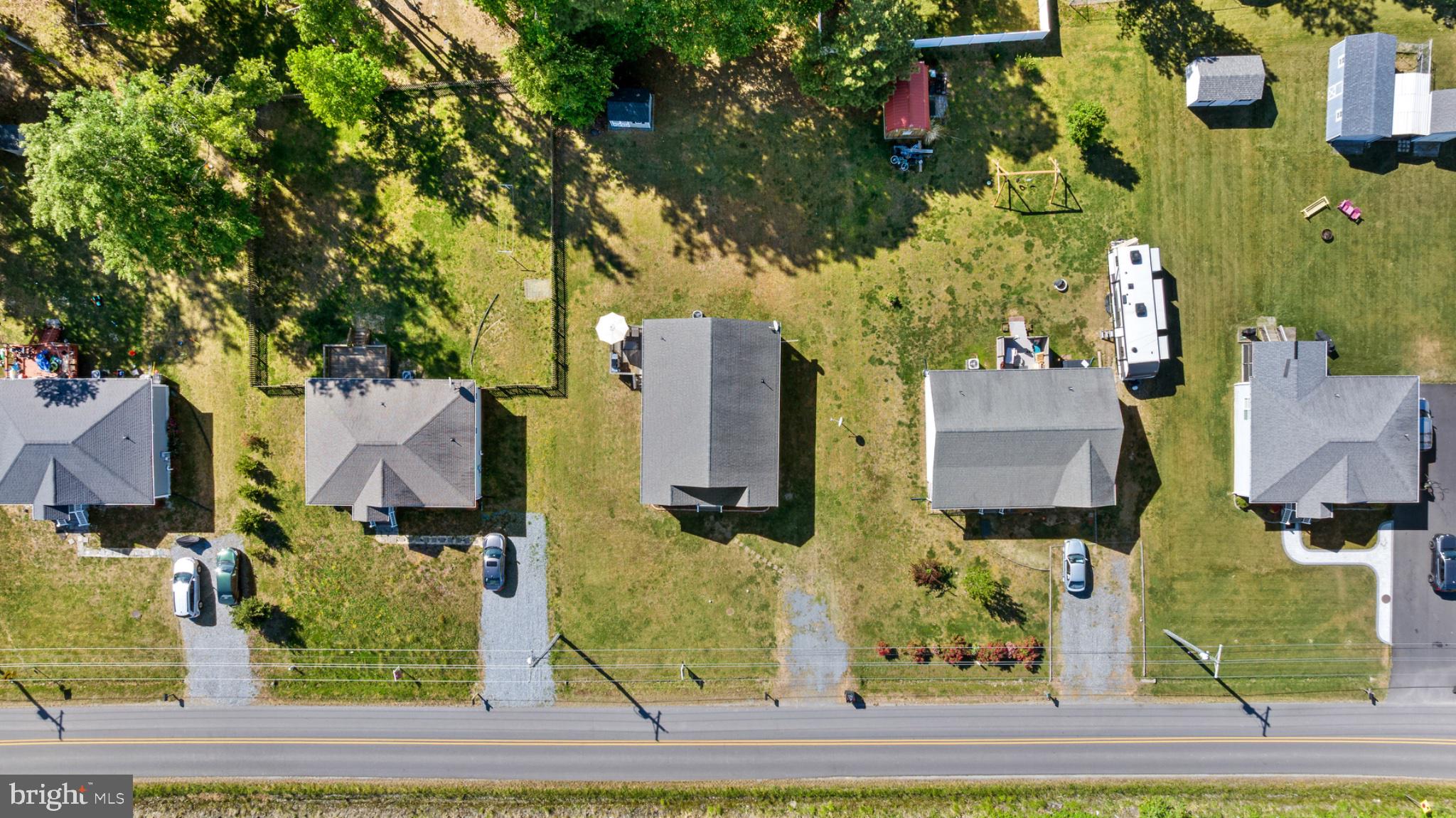 1523 Bowie Road Colonial Beach, VA 22443 - Photo 4 of 34 an aerial view of residential houses with outdoor space