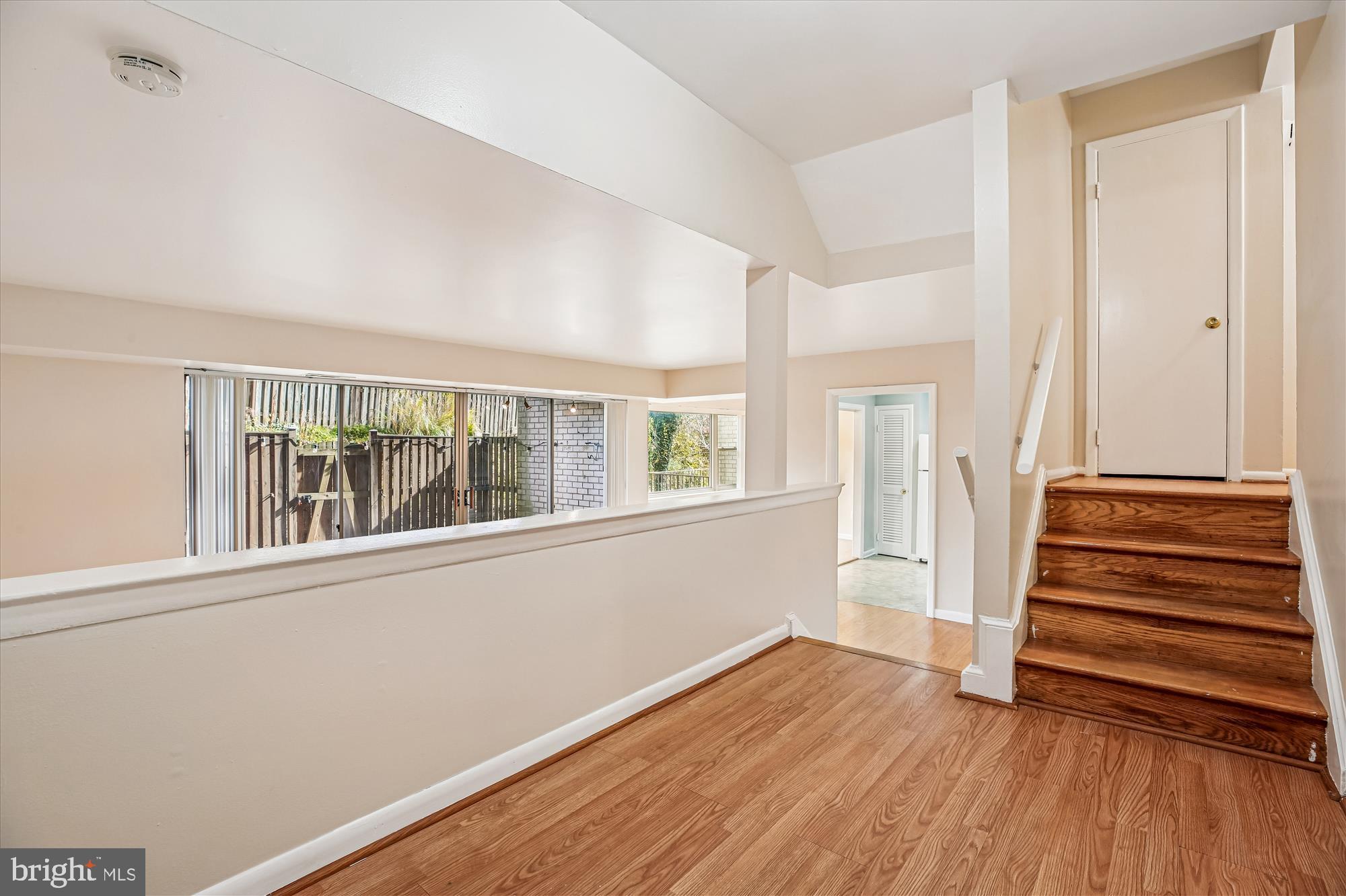 2517 Baltimore Road, Unit 25171 Rockville, MD 20853 - Photo 16 of 35 wooden floor in an empty room with a window