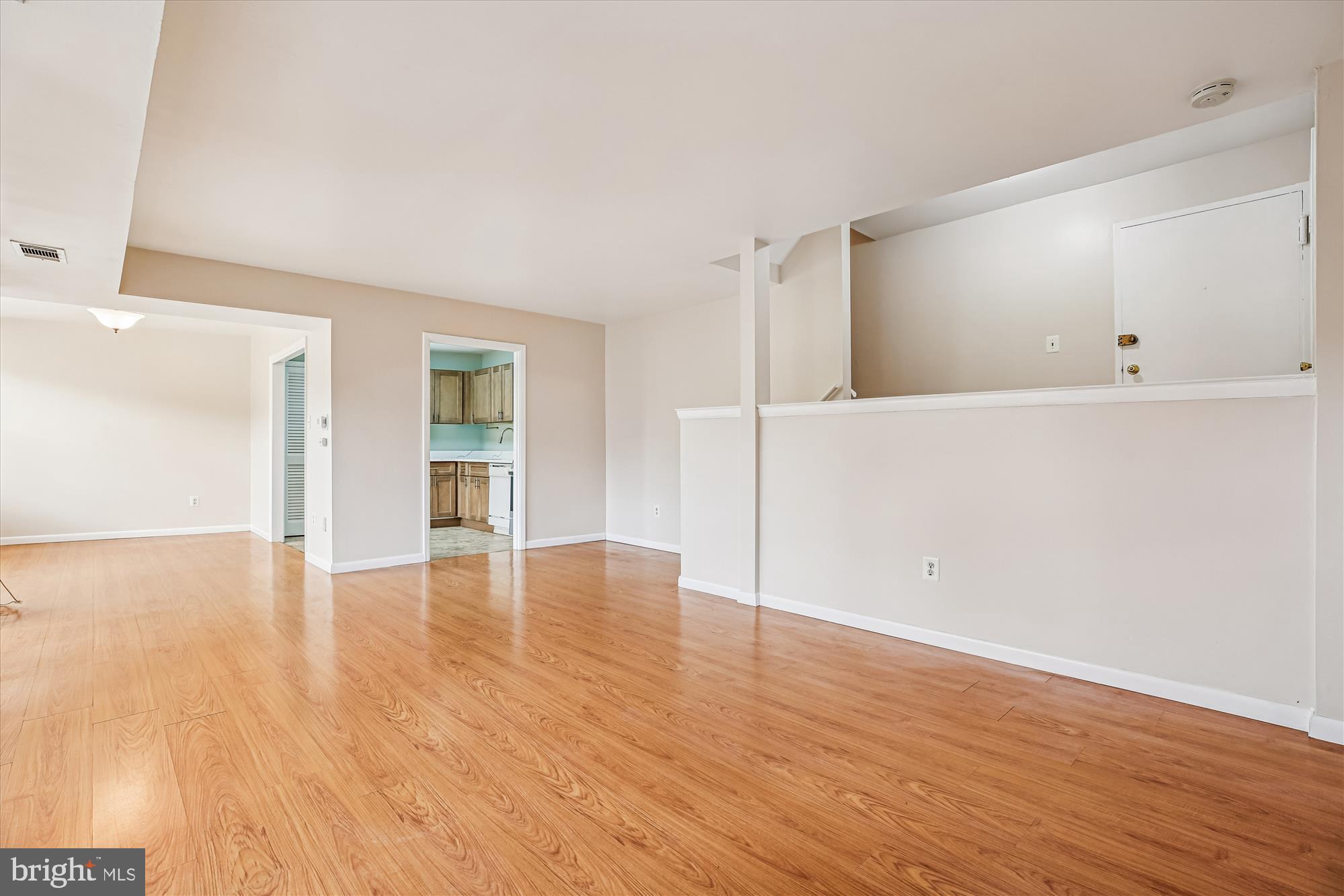 2517 Baltimore Road, Unit 25171 Rockville, MD 20853 - Photo 17 of 35 a view of an empty room with wooden floor