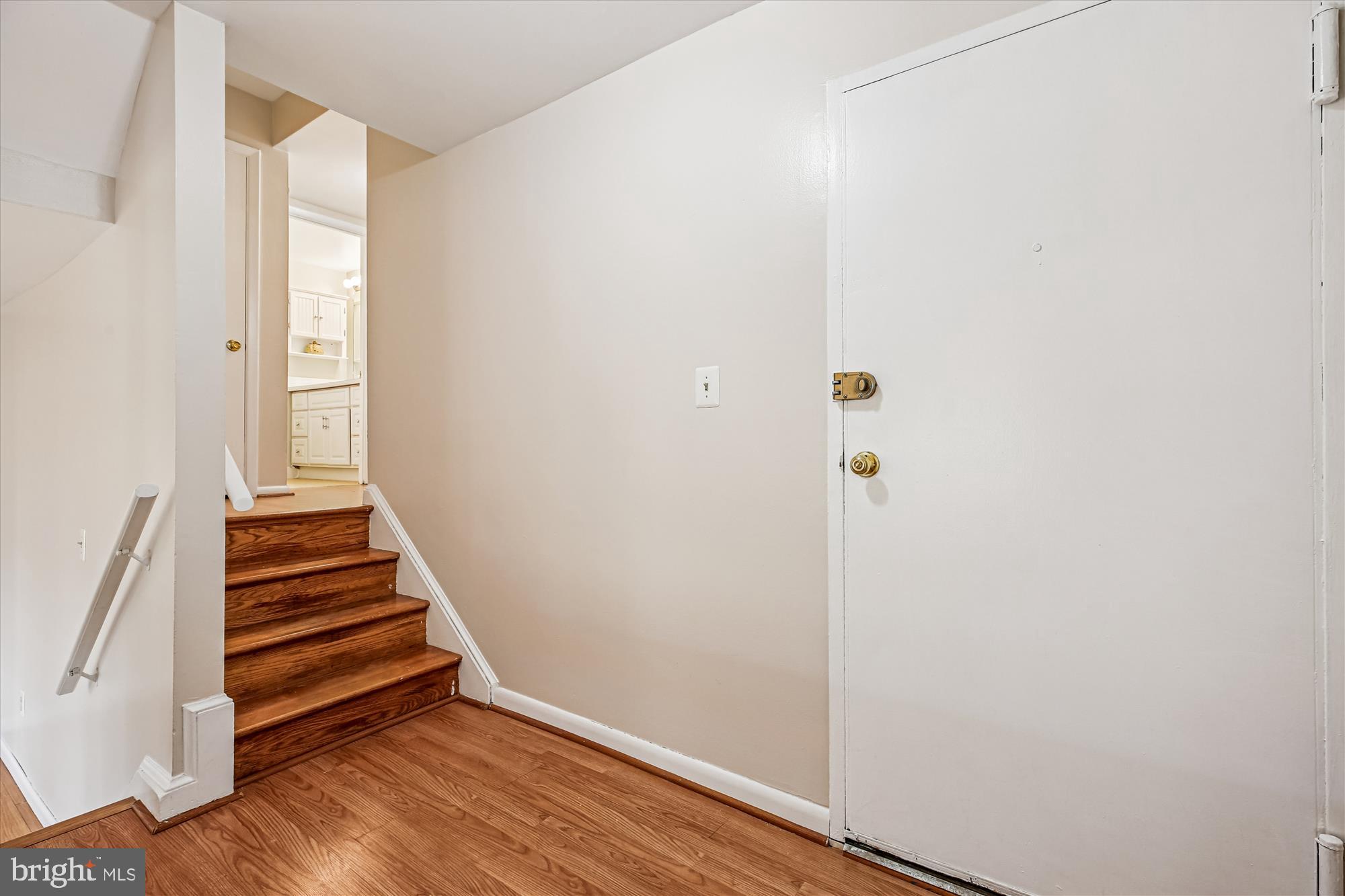 2517 Baltimore Road, Unit 25171 Rockville, MD 20853 - Photo 18 of 35 a view of an entryway with wooden floor