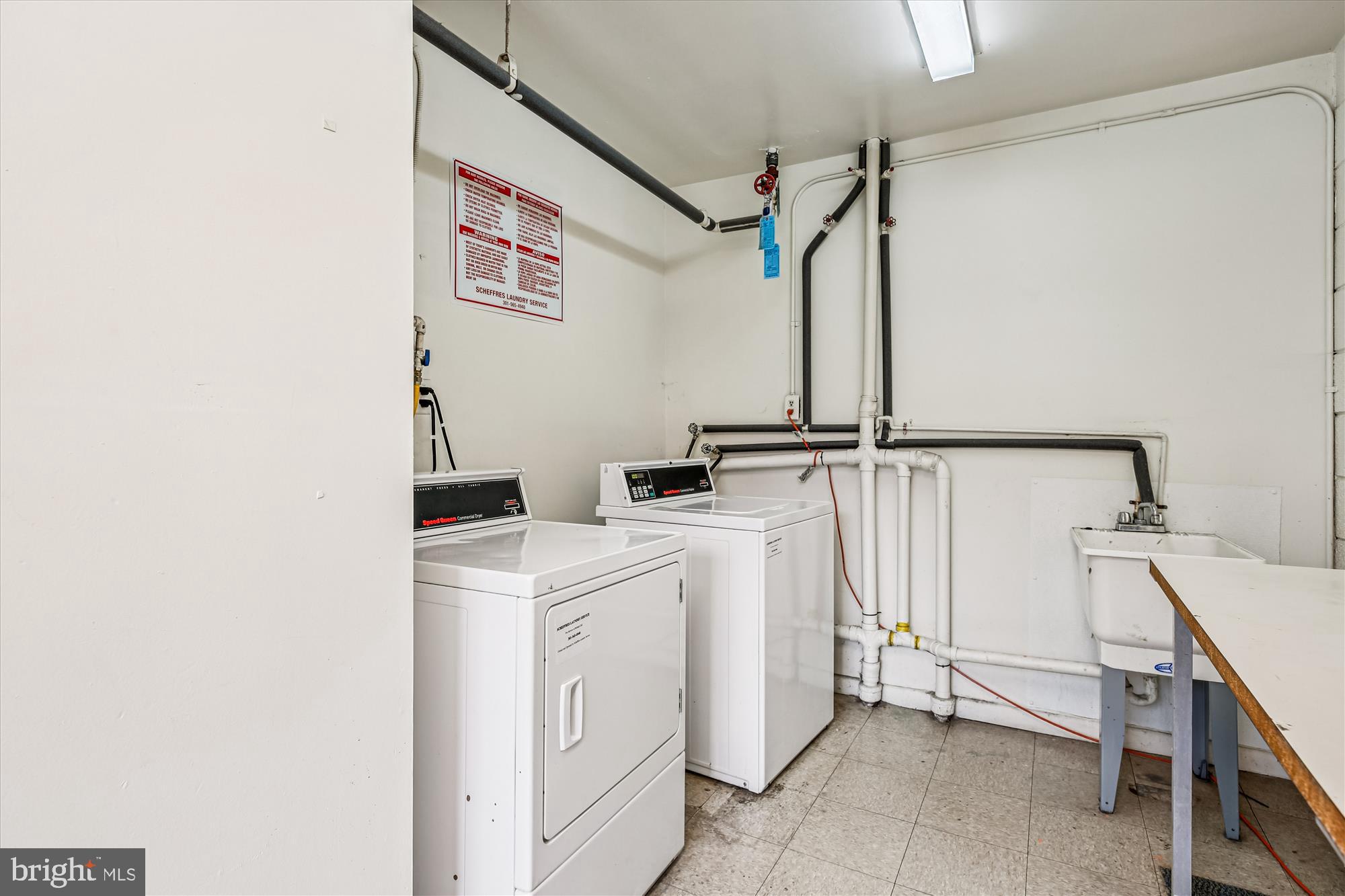 2517 Baltimore Road, Unit 25171 Rockville, MD 20853 - Photo 19 of 35 a utility room with dryer and washer